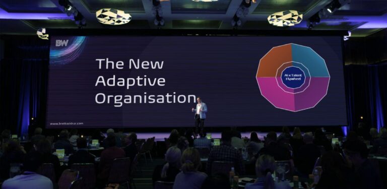 Brett Wiskar presenting conference keynote on adaptive organisations