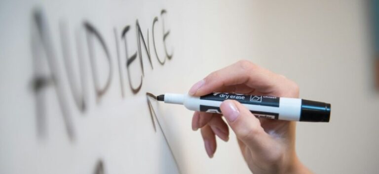 The word audience drawn on a whiteboard