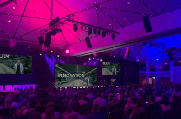 Brett Wiskar delivering keynote at Innovation Summit